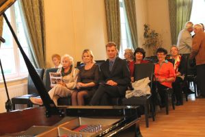 <b>1117th Liszt Evening </b>   - District Office in Trzebnica,   23.09.2014 r. The listeners arrived in great number much before the beginning of the concert. In the first row: Starost of Trzebnica Robert Adach with wife. Photo by Jowita Malogoska.